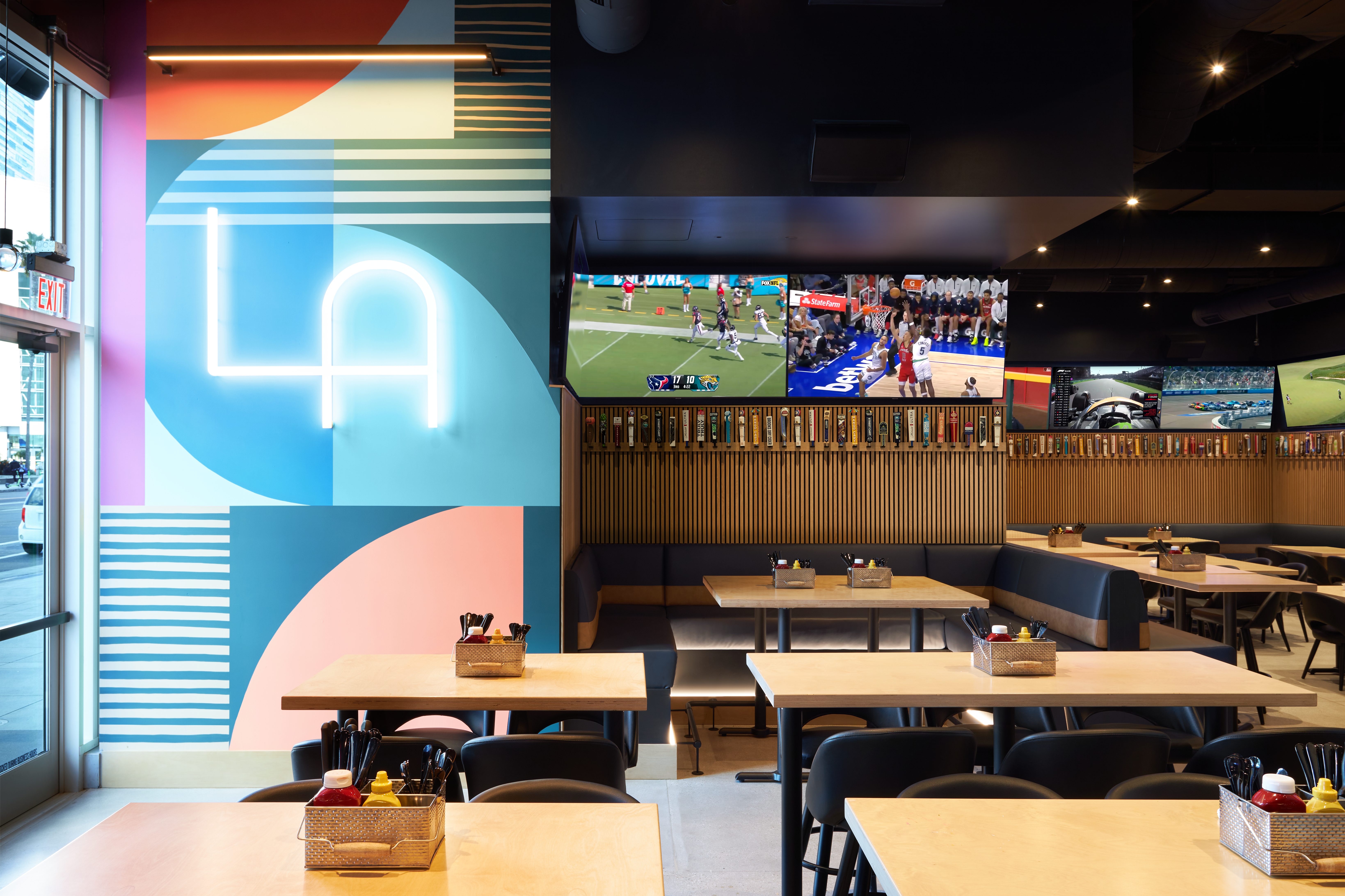 Local and family-owned 33 Taps is a neighborhood sports bar that wanted to establish a presence in downtown across from the sports/event area of L.A. Live. 

It is located on the ground floor of the new Moxy Downtown Los Angeles hotel by Marriott. 

