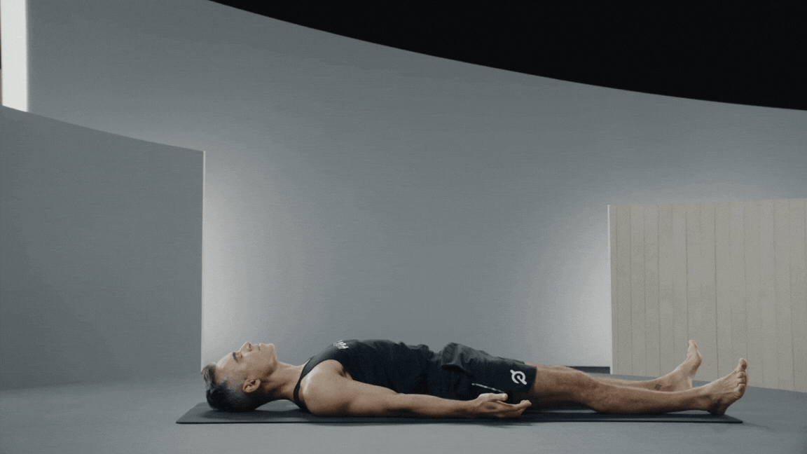 Peloton instructor Ross Rayburn demonstrates yoga backbend Bridge Pose with proper form