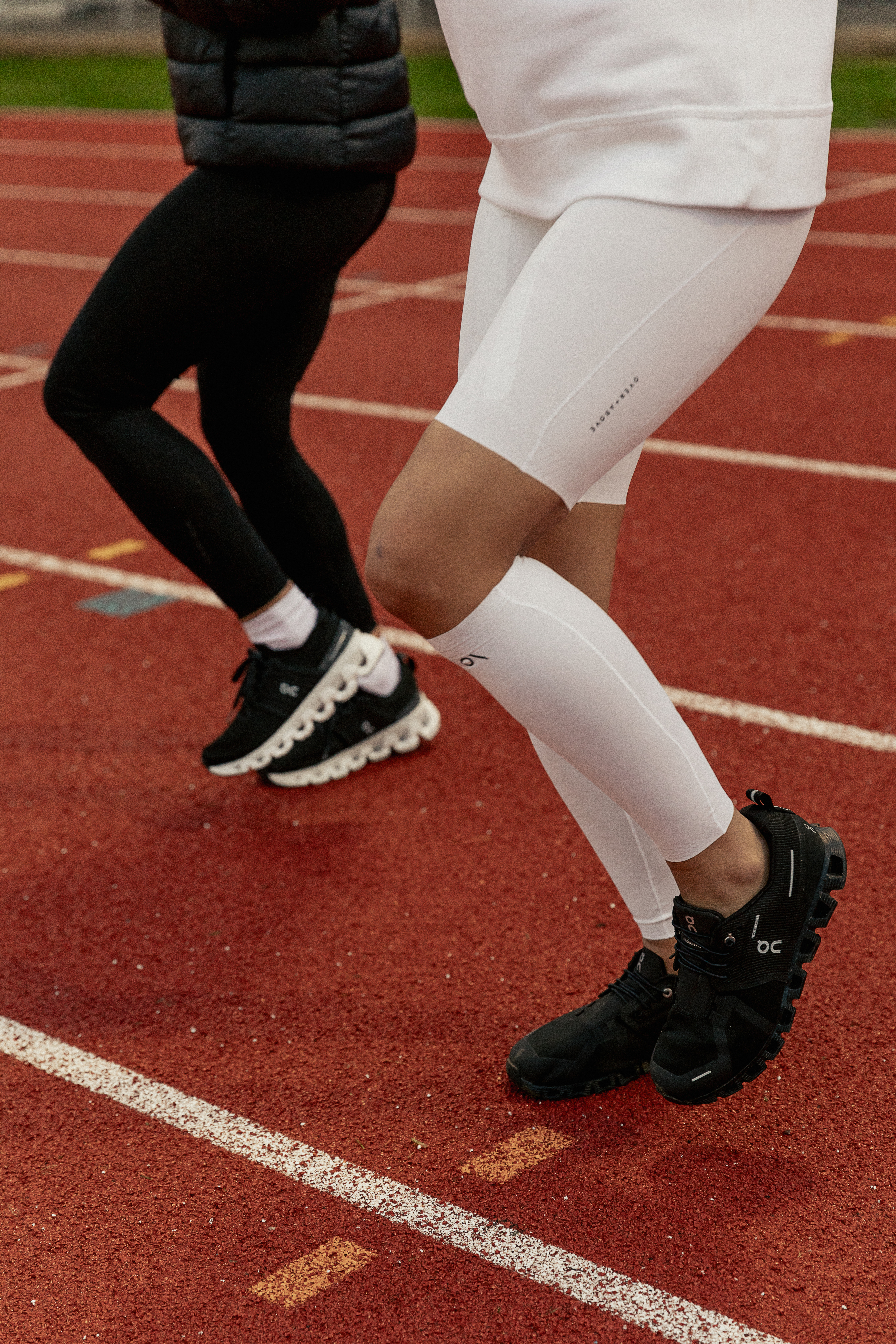 Two People in Compression Gear