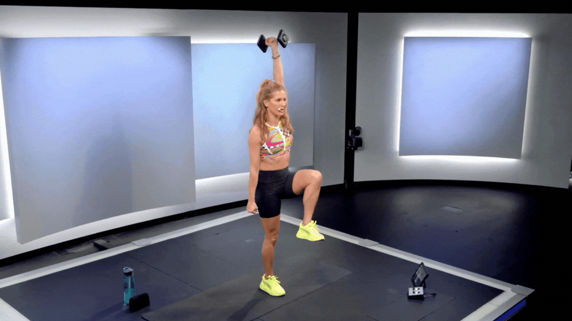 Rebecca Kennedy demonstrates offset overhead march exercise move 