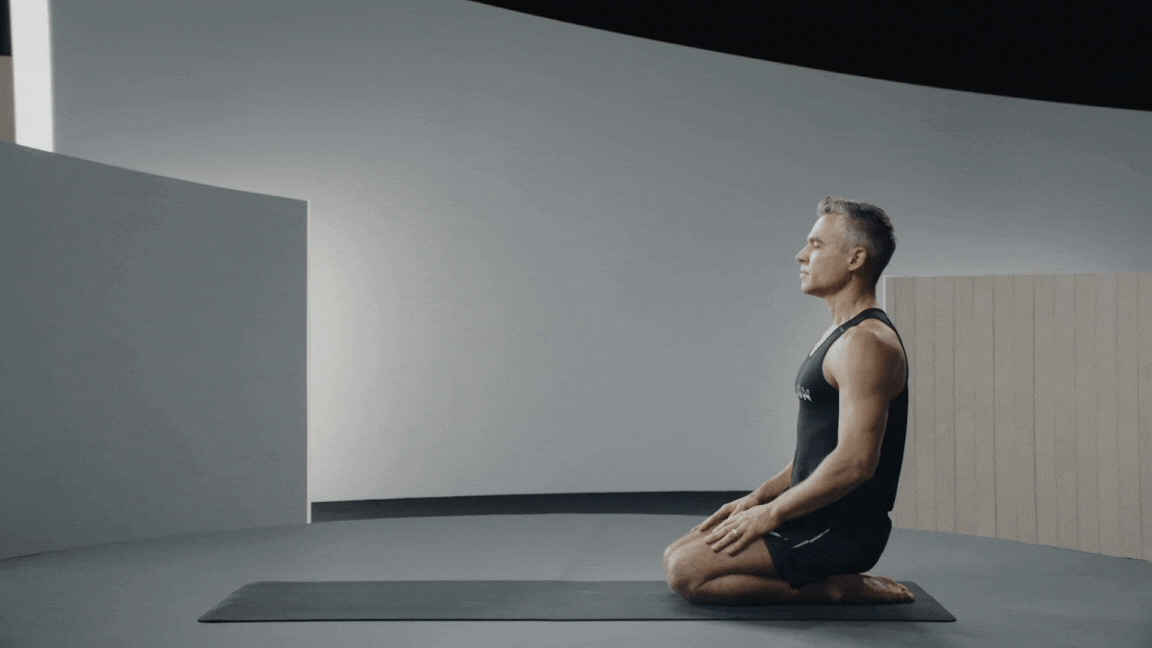 Peloton instructor Ross Rayburn demonstrates Crow Pose in yoga for core strength