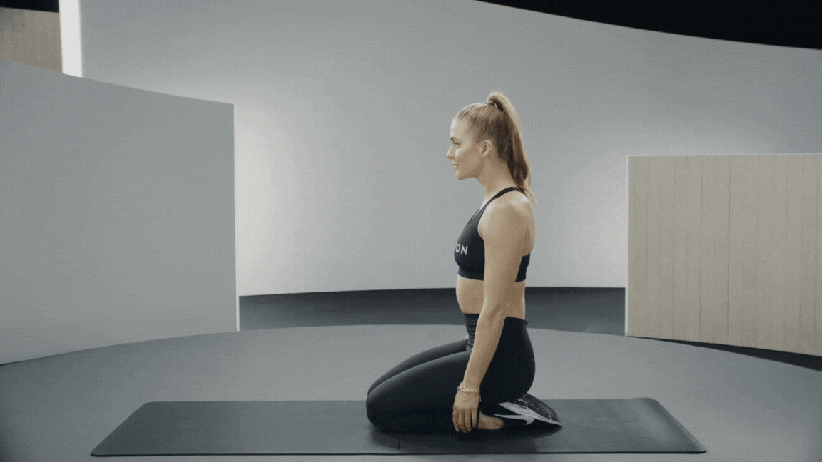 Peloton instructor Rebecca Kennedy demonstrates plank pose in yoga with proper form