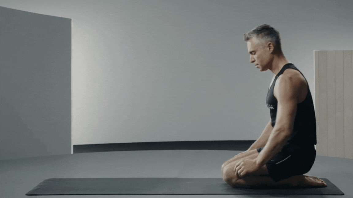 GIF of Ross Rayburn doing Crow Pose 