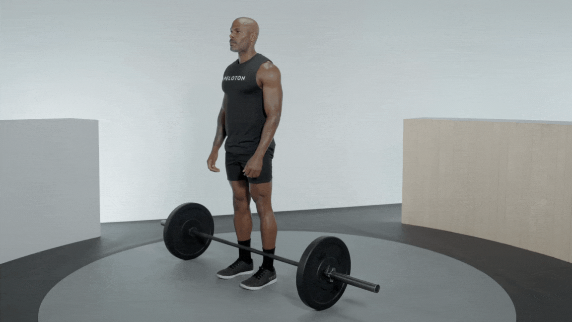 Peloton instructor Adrian Williams demonstrates a barbell single-leg deadlift with proper form