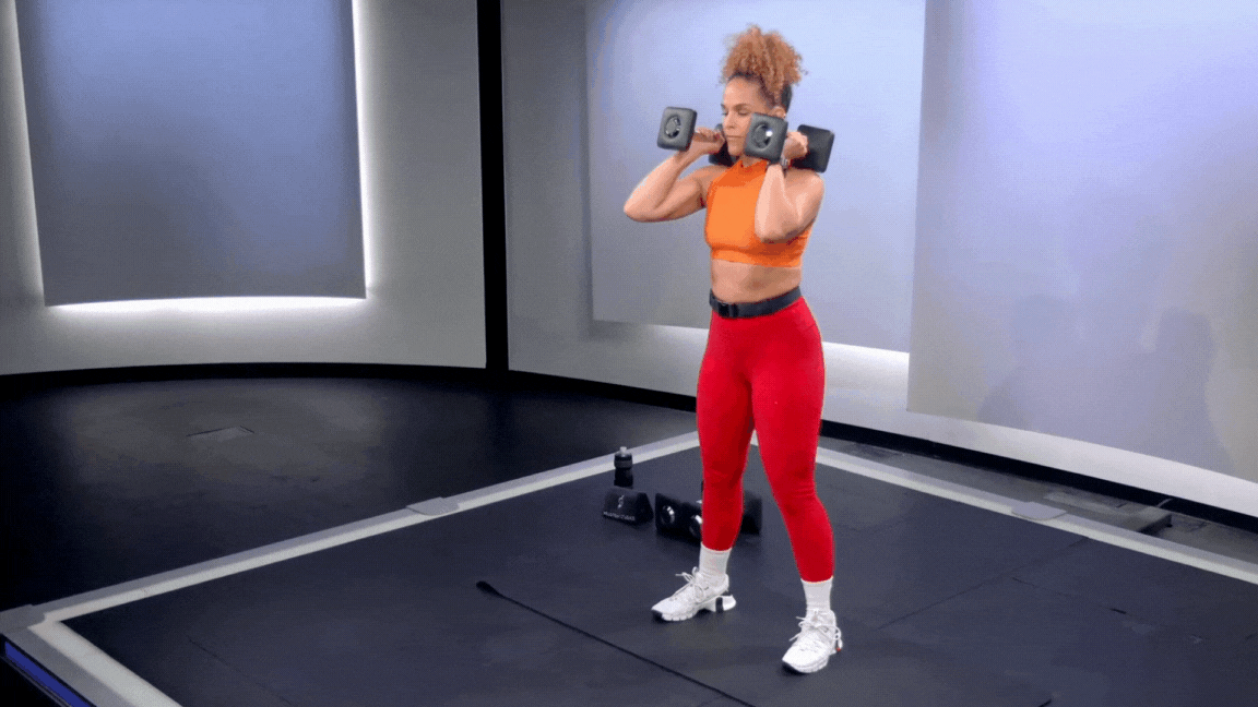 Peloton instructor Jess Sims demonstrates an eccentric squat with calf raise as part of strength training for basketball