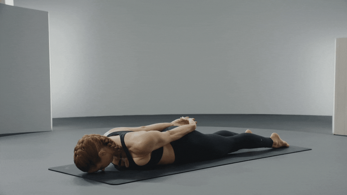 Jess King demonstrates a Pilates Double Leg Kick