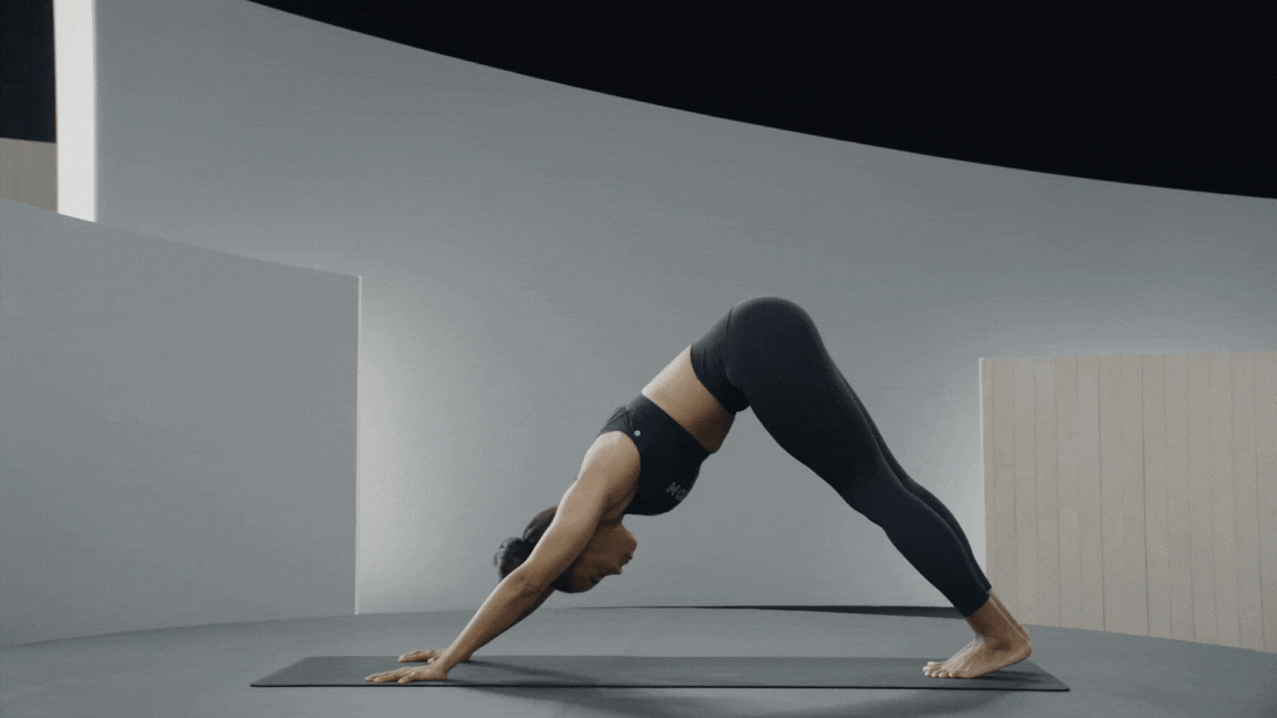 A Peloton instructor demonstrates side plank pose in yoga for core strength