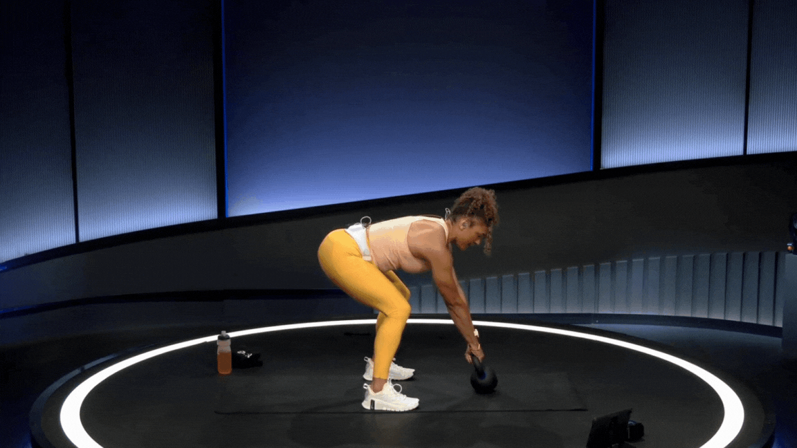 Peloton instructor Joslyn Thompson Rule demonstrates a kettlebell swing hamstring exercise with proper form