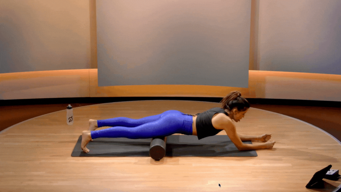 Hannah Corbin demonstrates foam rolling the quad muscles 