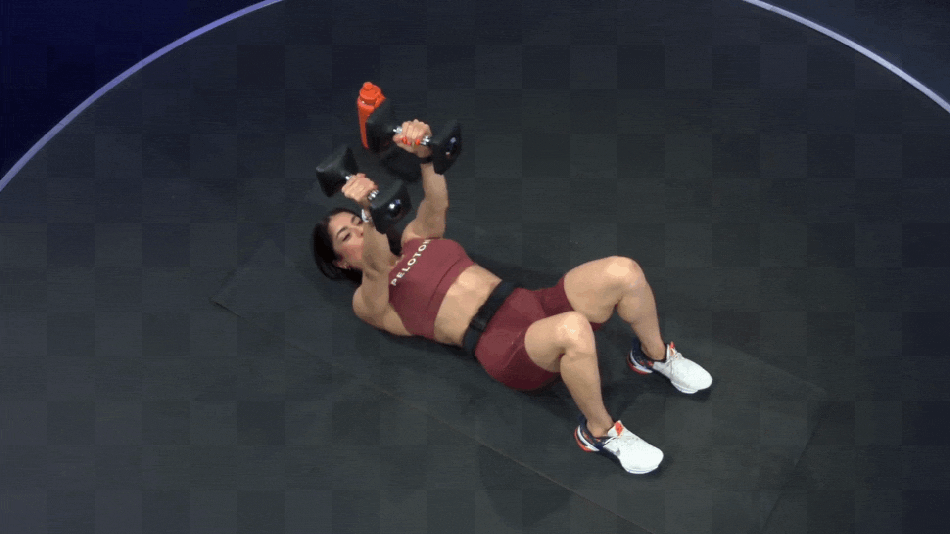 Assal Arian doing a neutral grip chest press