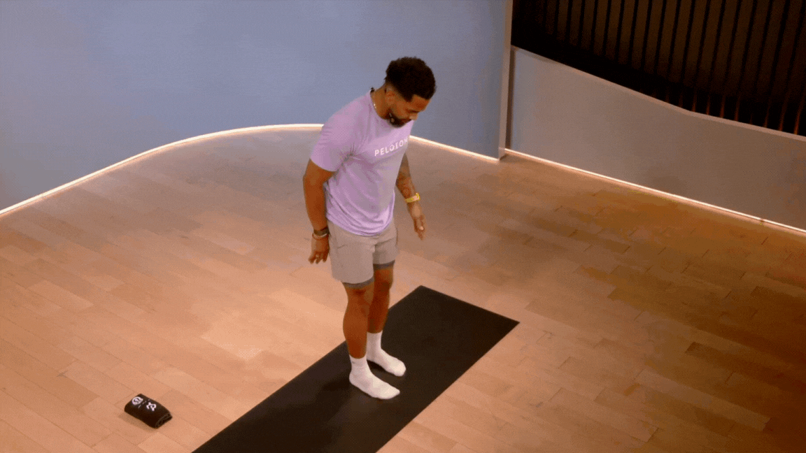 Rad Lopez does a cross-legged forward fold