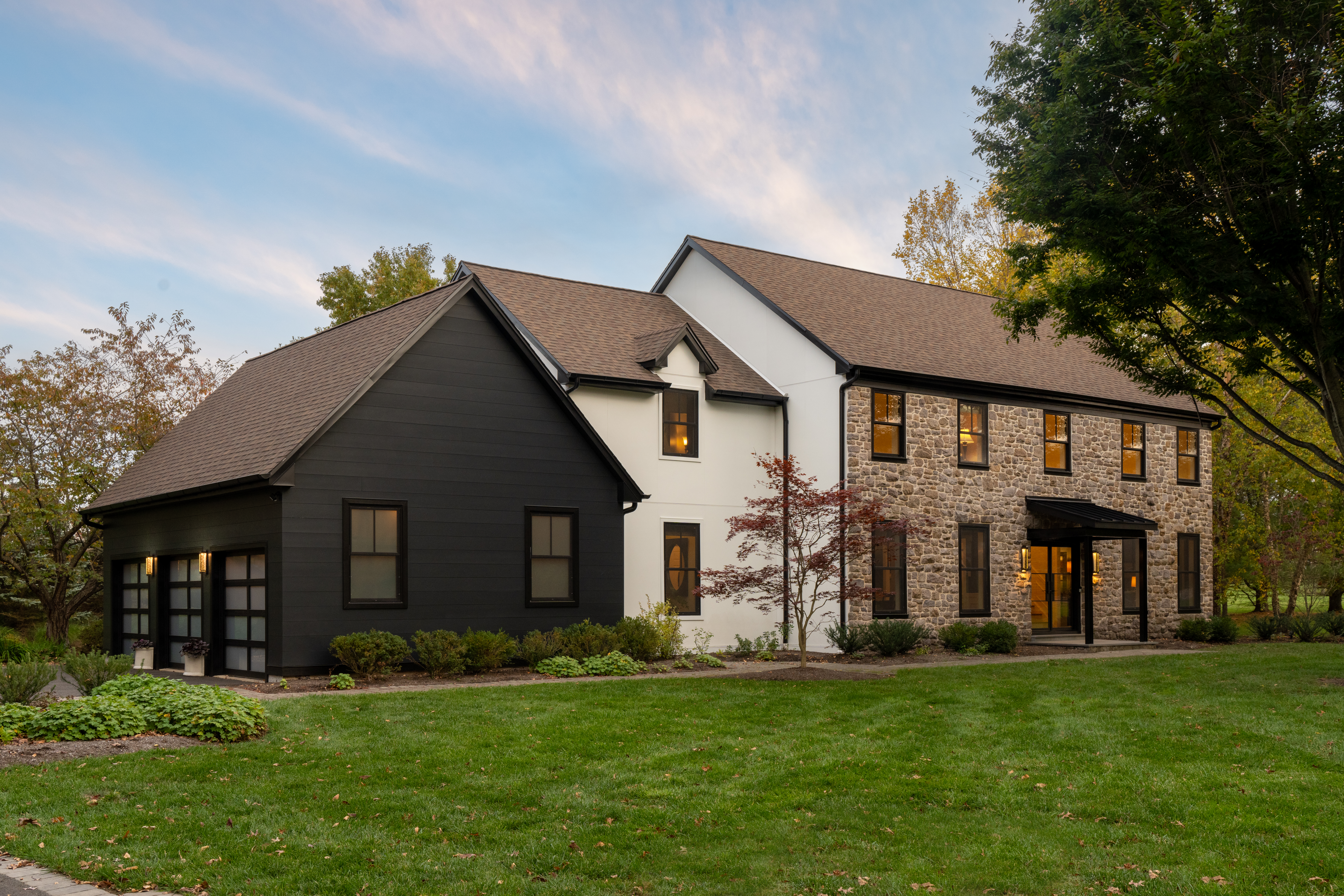 House Style Guide: Colonial house clad with Hardie Architectural Panels in Fine Sand, a custom field-painted color, and Summer White