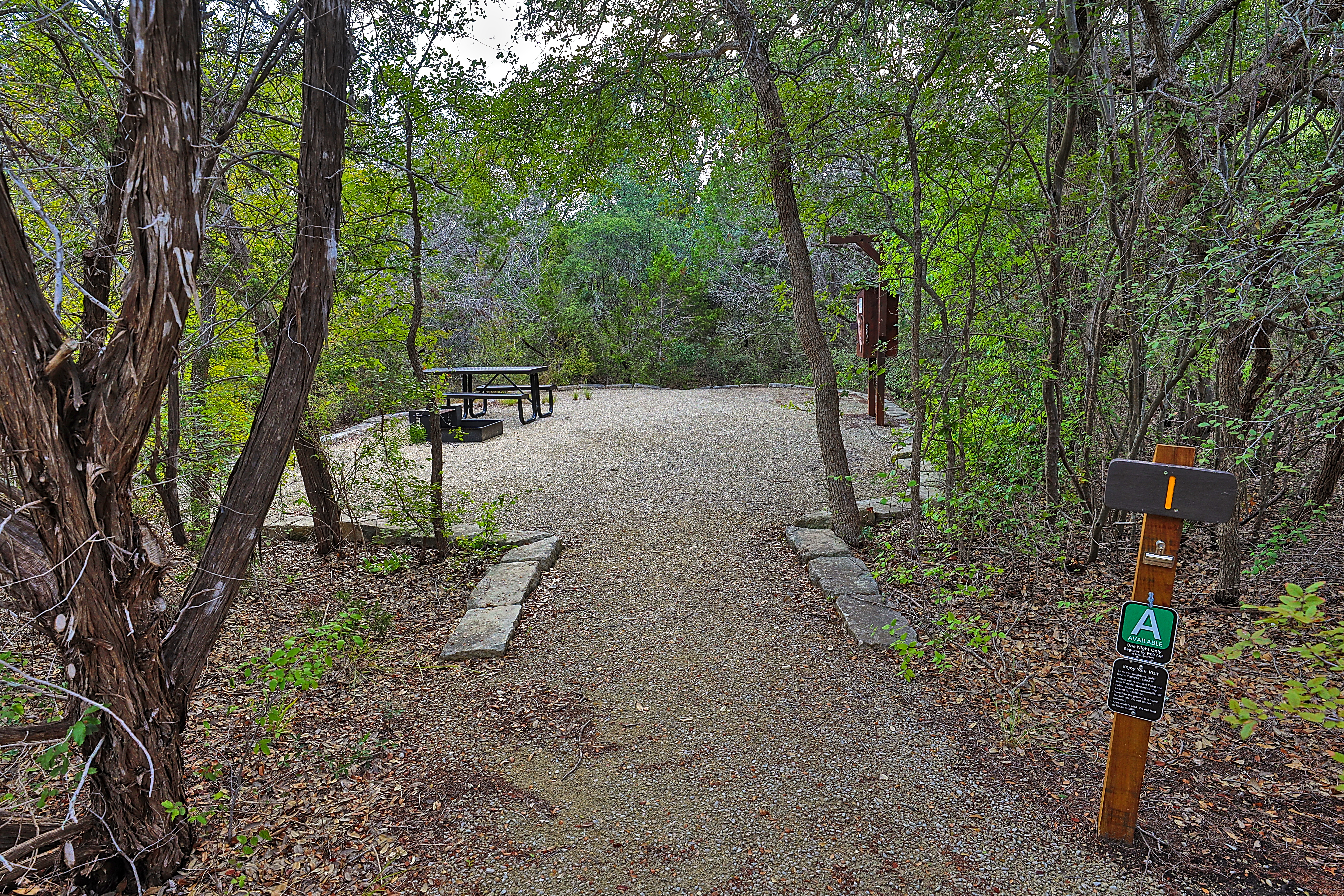 beautiful picnic area in treed area of park area