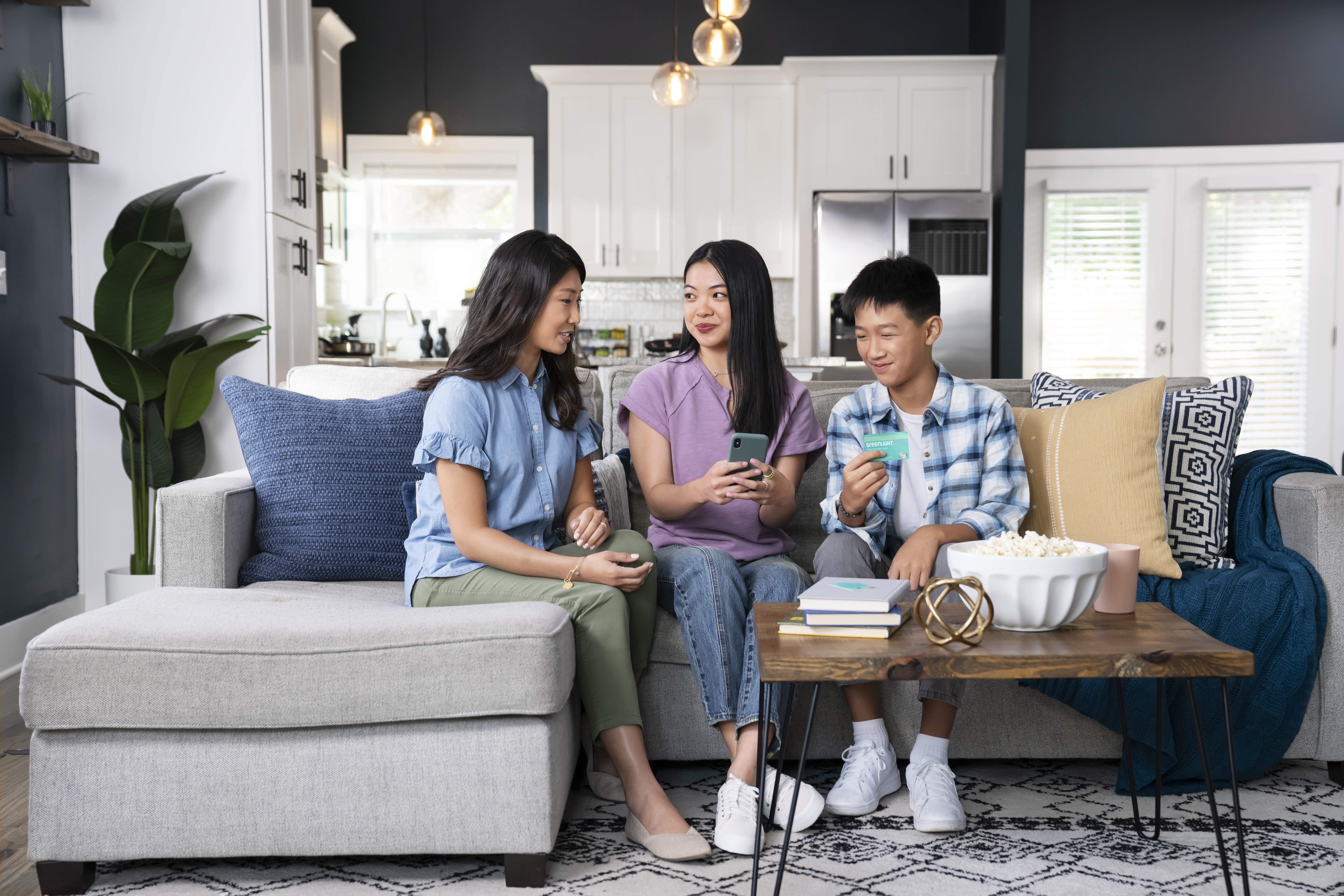 Mom and children sitting on couch