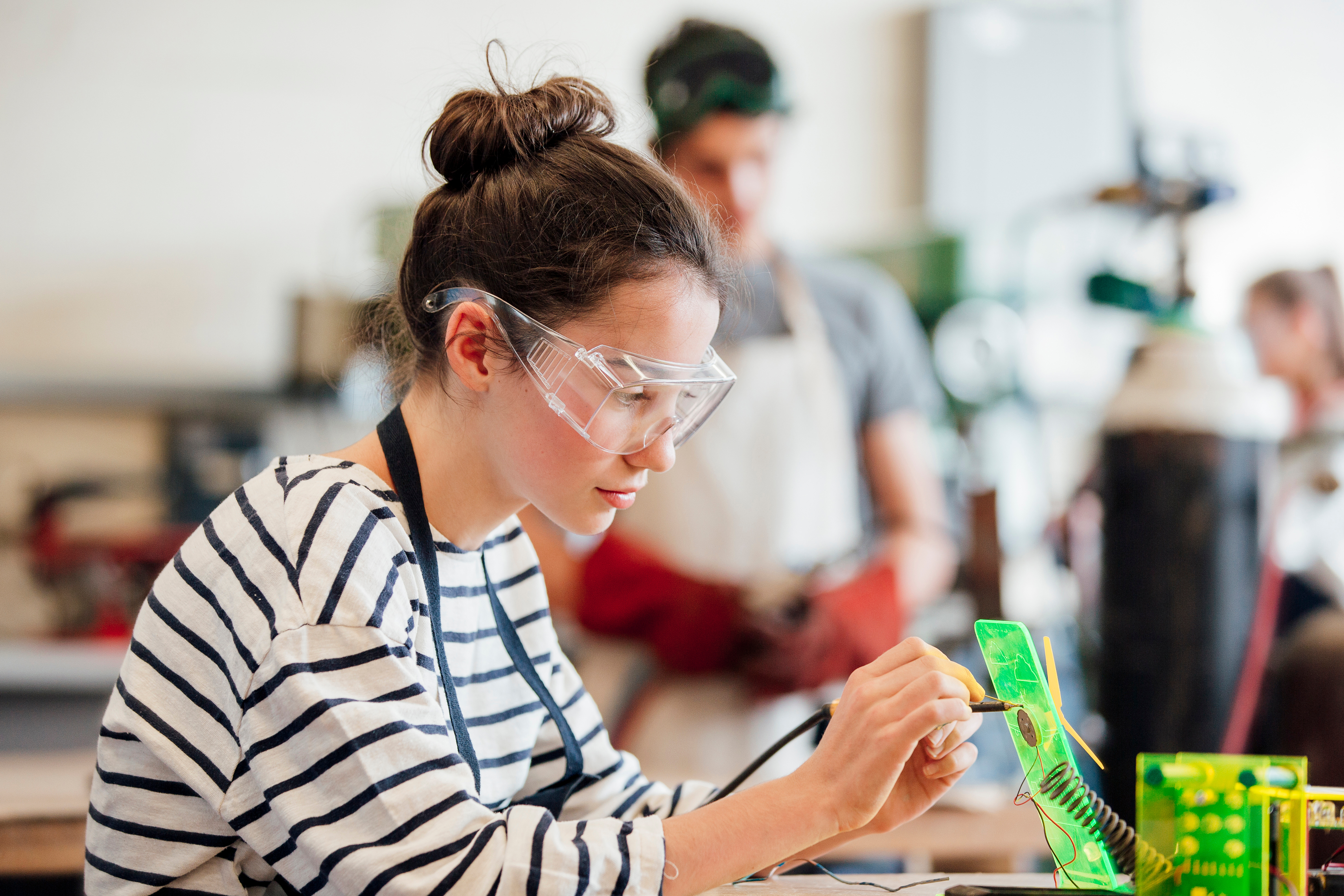 Girl in engineering classroom