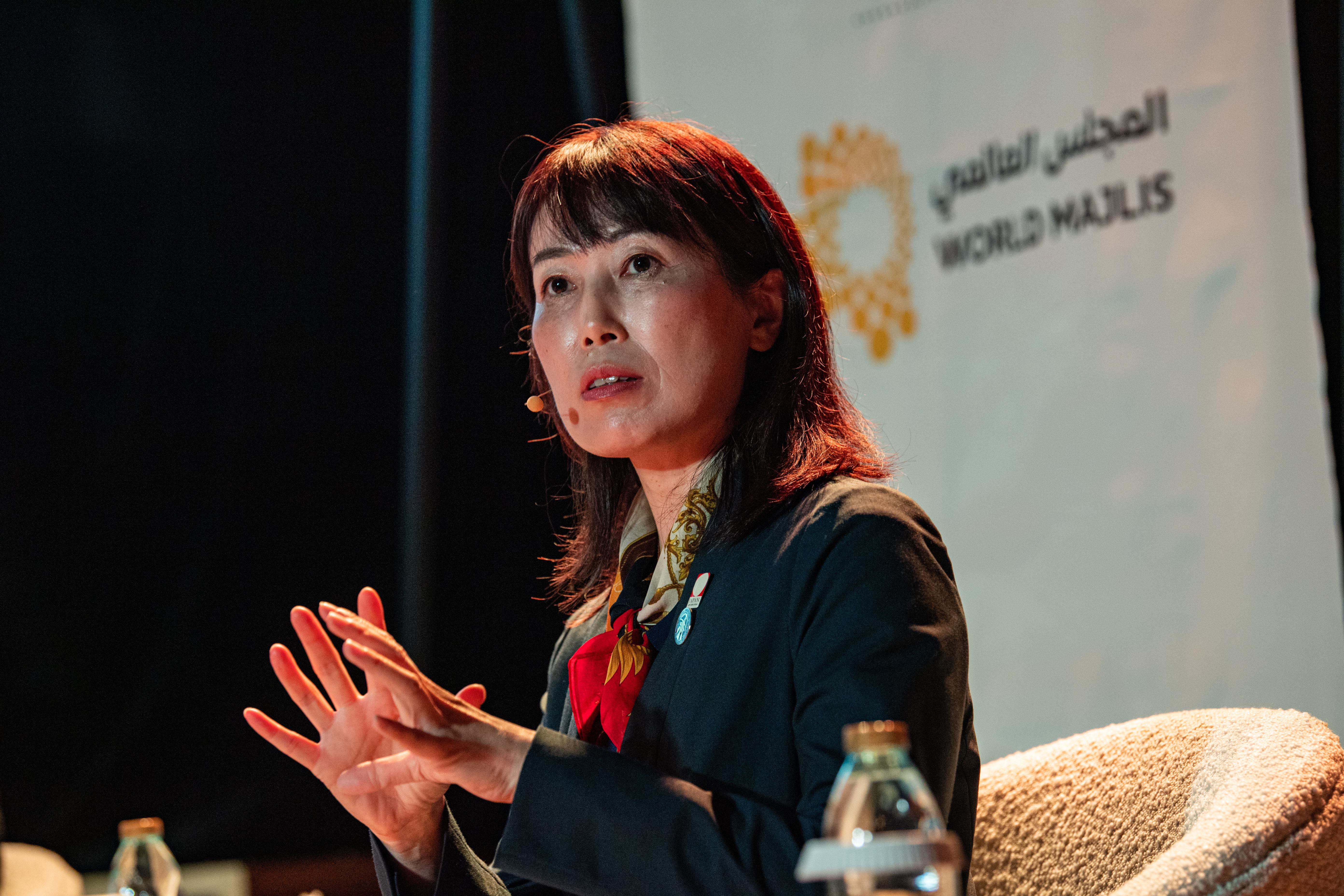 Naoko Yamazaki former JAXA astronaut speaks during World Majlis Lesson from Space at the India Pavilion Large Image m5144