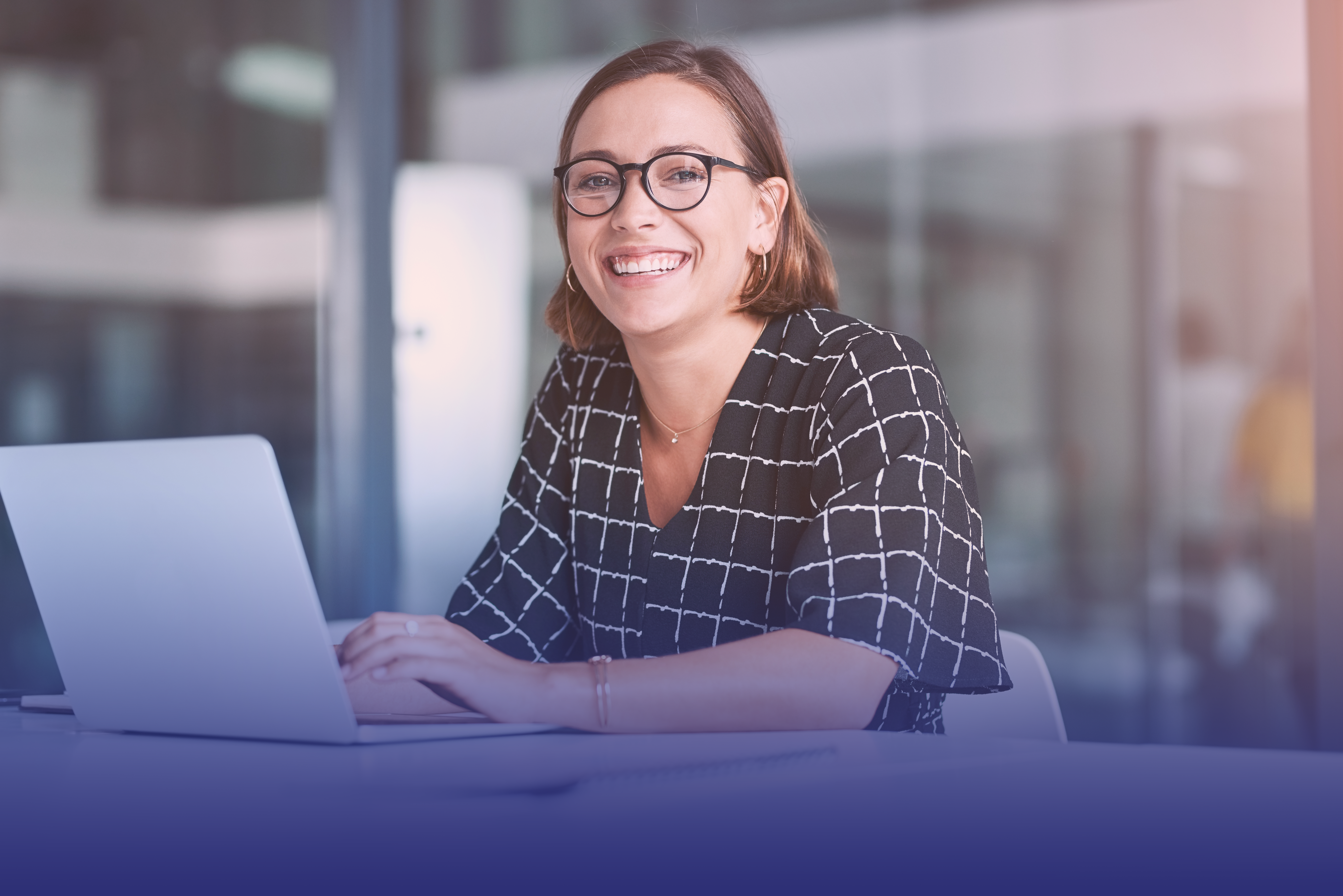 Image of woman at work in front of computer