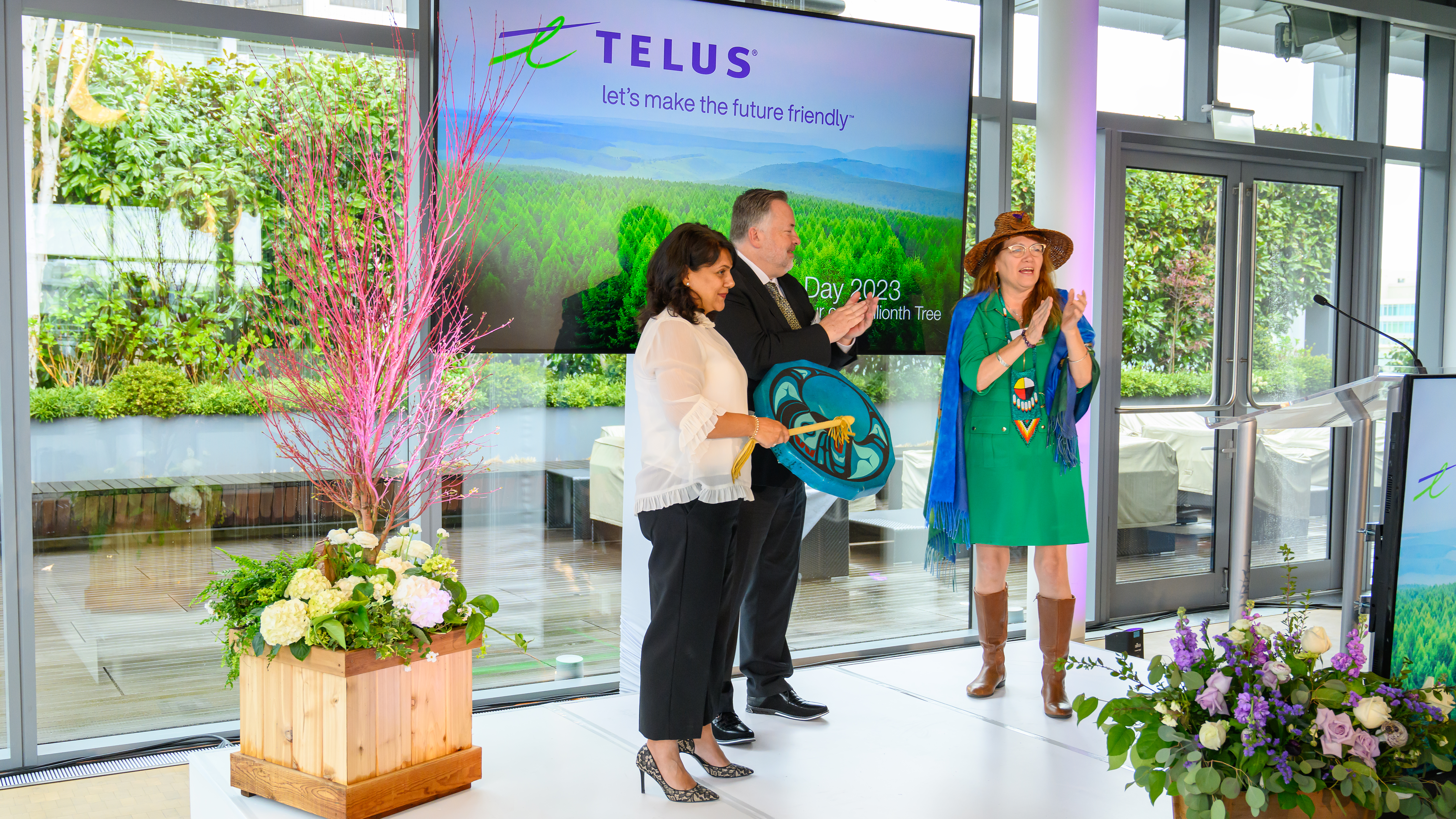 TELUS team members making a presentation on Earth Day.