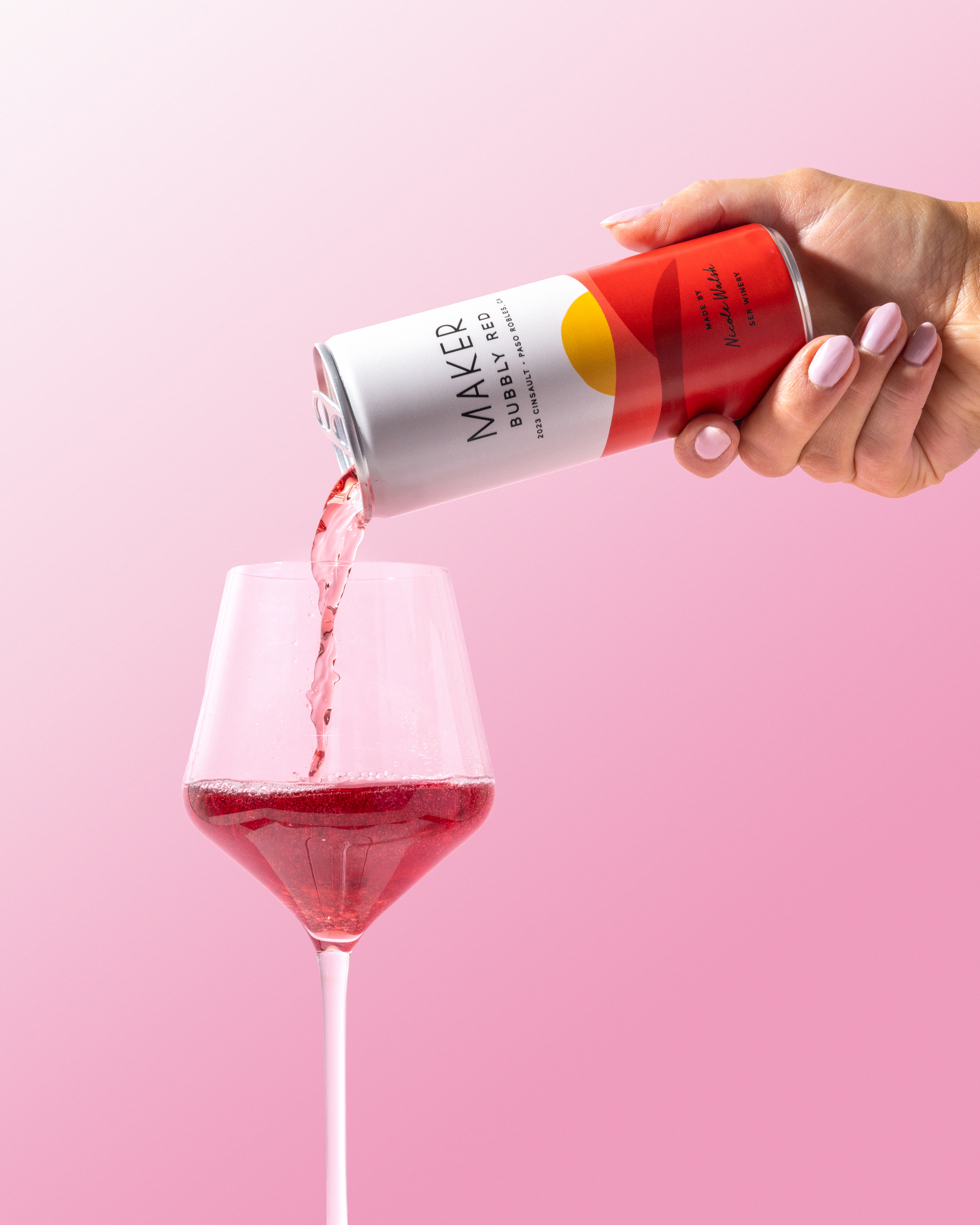 Can of Maker Wine Bubbly Red Being Poured into a Glass Photo by Clara Jones Photography