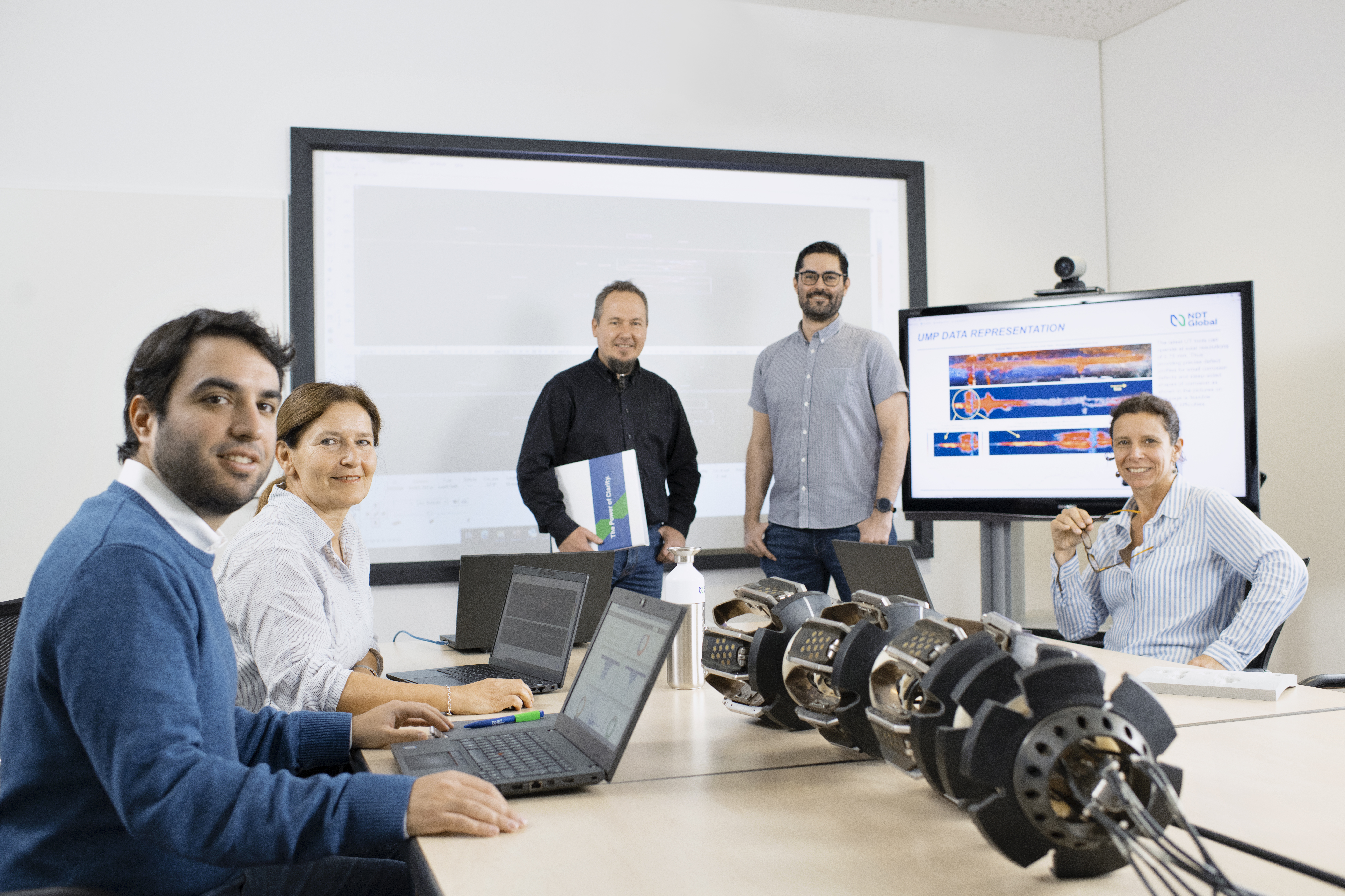 NDT Global Employees in meeting 