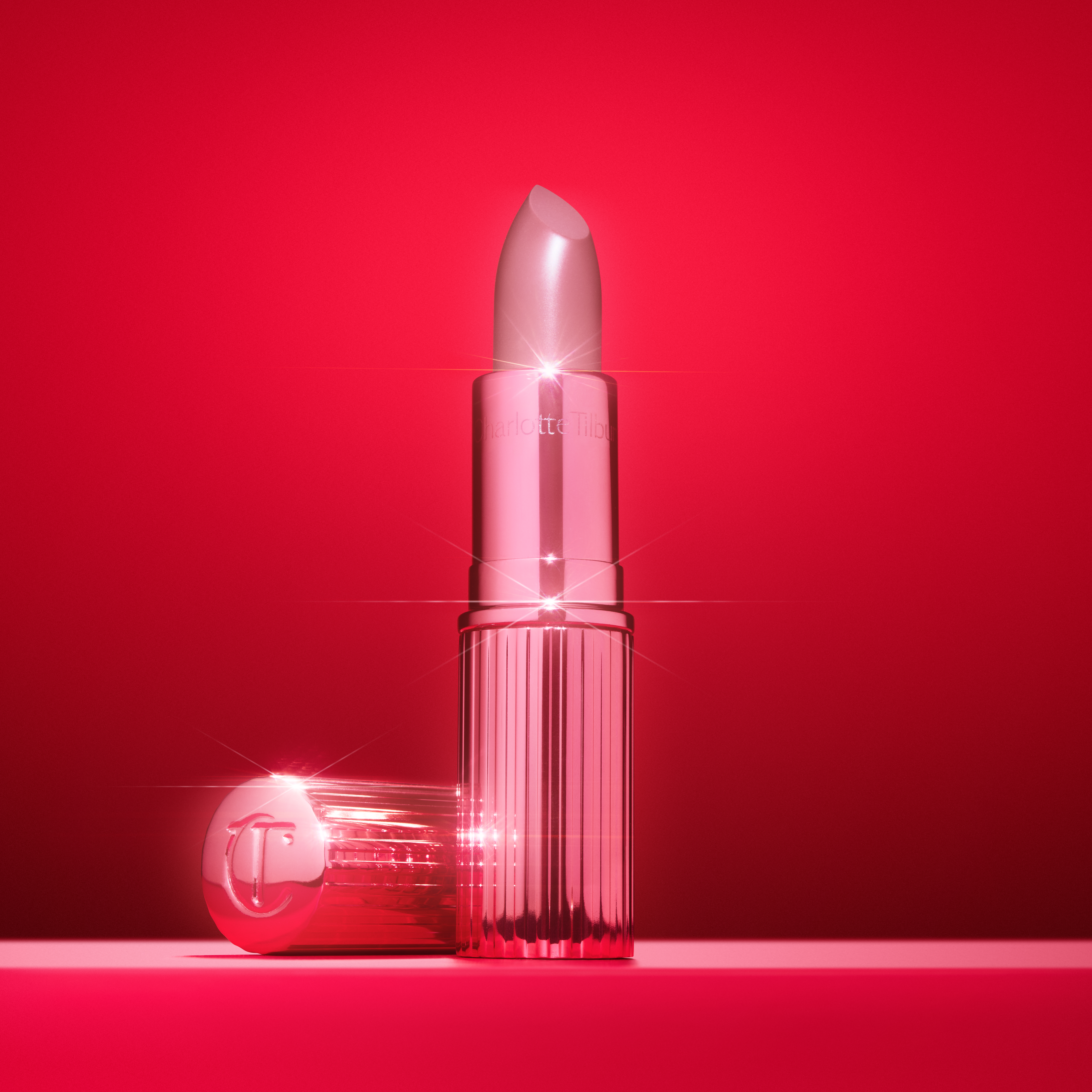 Charlotte's smooth, satin-shine KISSING lipstick formula