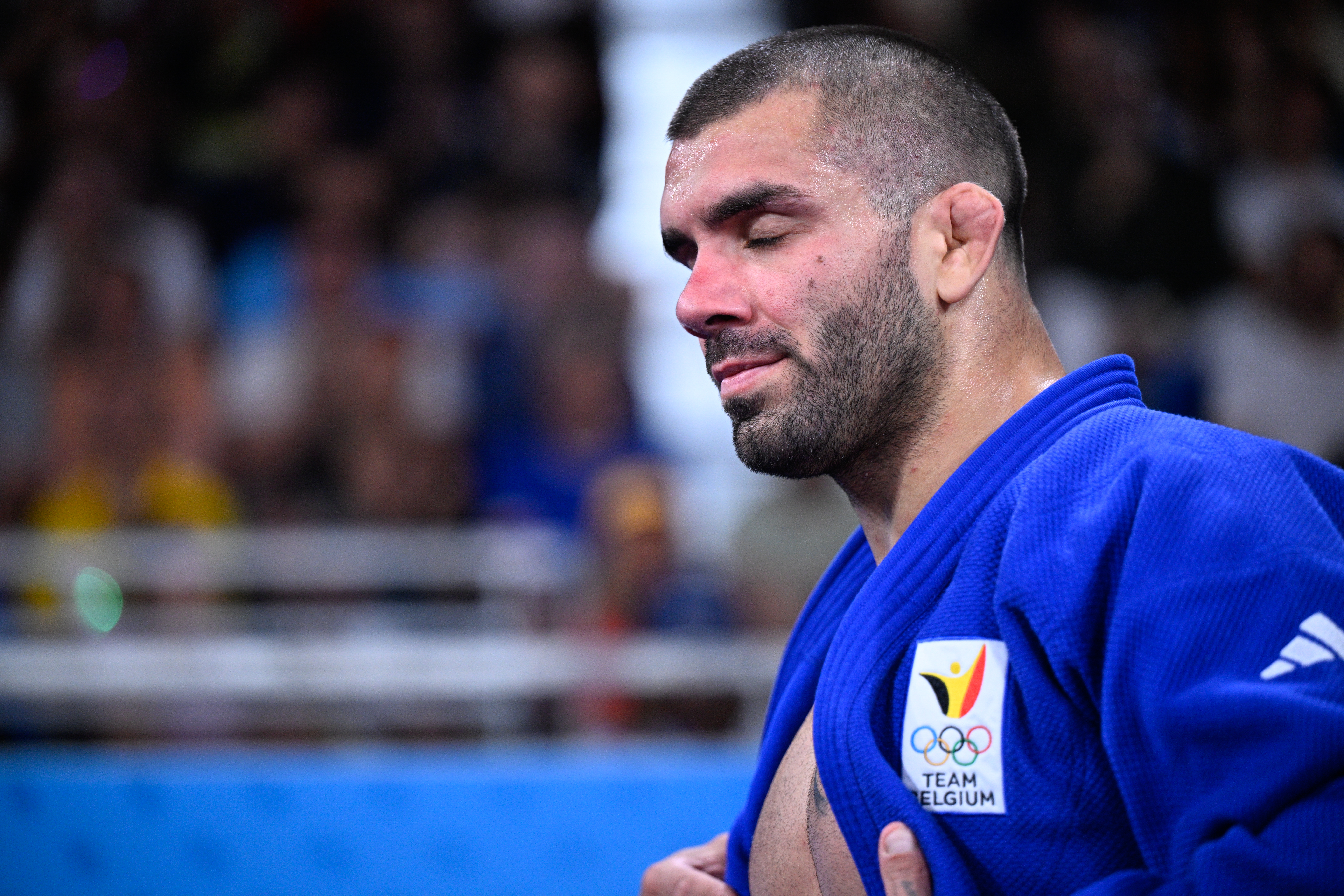 Belgian judoka Toma Nikiforov looks dejected after losing a judo bout between Belgian Nikiforov and Kazach Sharkhan in the elimination round of 64 of the -100kg category of the men's judo competition at the Paris 2024 Olympic Games, on Thursday 01 August 2024 in Paris, France. The Games of the XXXIII Olympiad are taking place in Paris from 26 July to 11 August. The Belgian delegation counts 165 athletes competing in 21 sports. BELGA PHOTO JASPER JACOBS