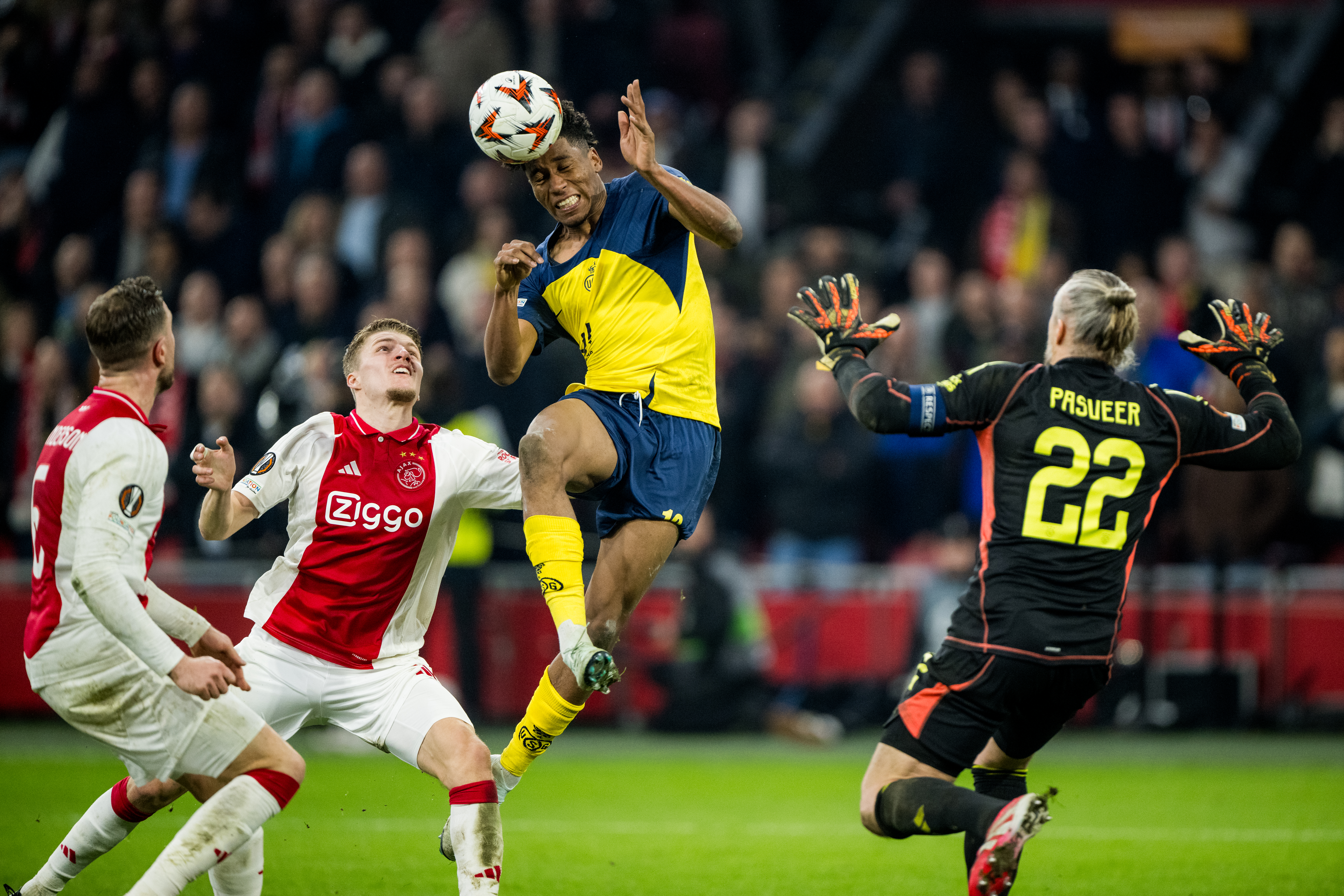 Union's Kevin Rodriguez and Ajax' Remko Pasveer fight for the ball during a soccer match between Dutch AFC Ajax and Belgian Royale Union Saint-Gilloise, Thursday 20 February 2025 in Amsterdam, the Netherlands, the return leg of the Knockout phase play-offs of the UEFA Europa League competition. BELGA PHOTO JASPER JACOBS