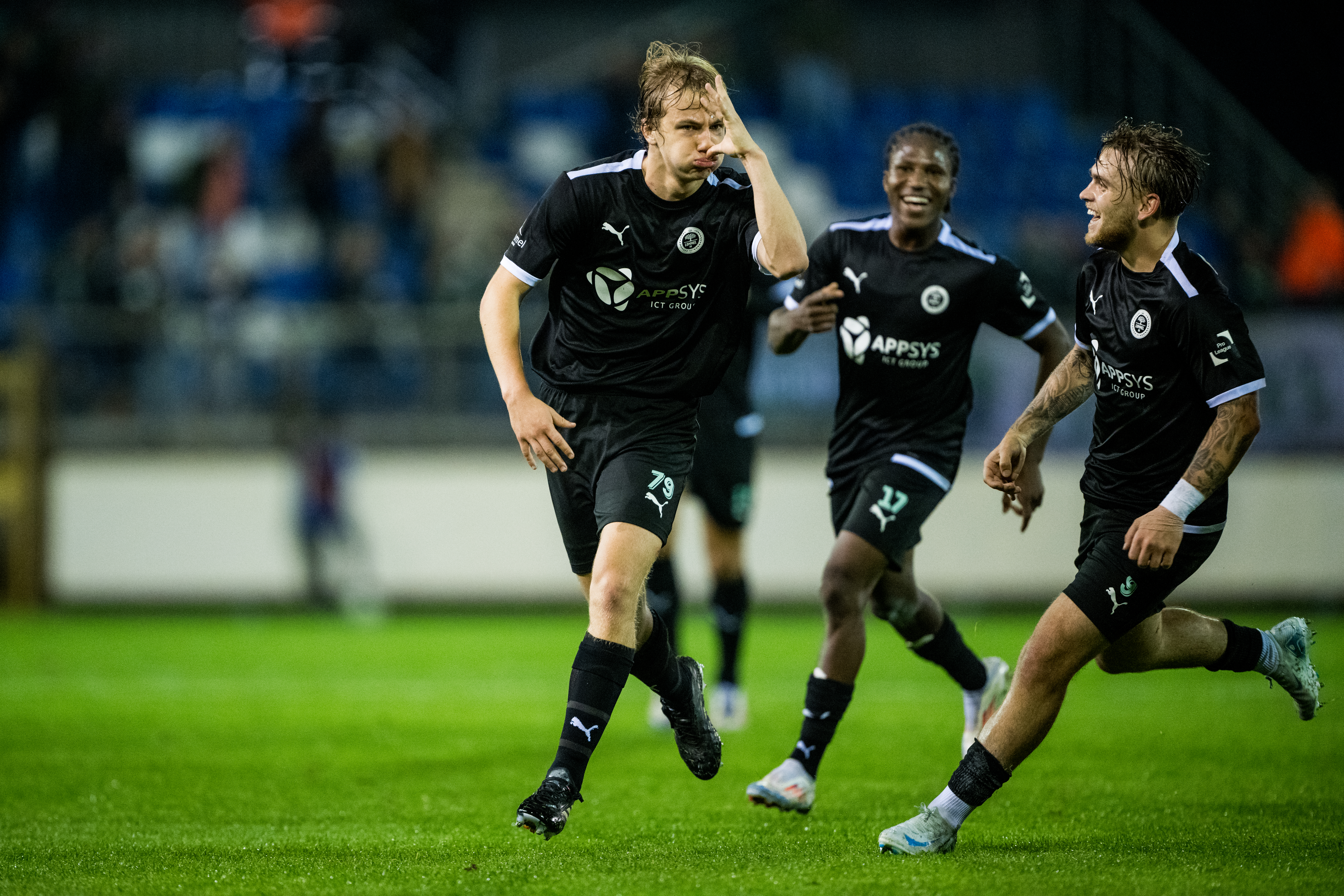 Lommel's Sam De Grand and Lommel's Jason van Duiven celebrate after scoring during a soccer match between Jong Genk and Lommel SK, Friday 25 October 2024 in Geel, on day 9 of the 2024-2025 season of the 'Challenger Pro League' second division of the Belgian championship. BELGA PHOTO JASPER JACOBS